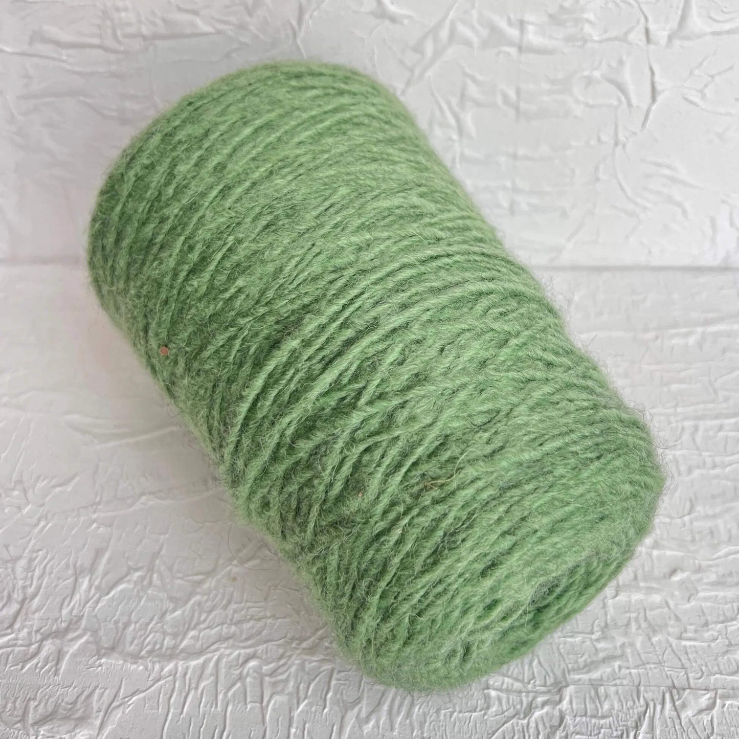 Bunny. Wool Yarn  50%, Baby Alpaca Yarn 25%, PA 25%. Color Green. Per 100 gr