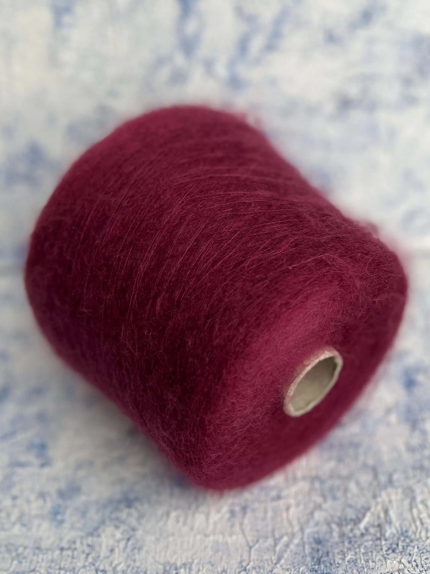 Super Kid Mohair yarn 67%, PA 30%, Merino yarn 3%. Yarn on Cone,Color Bordo. Per 100 gr