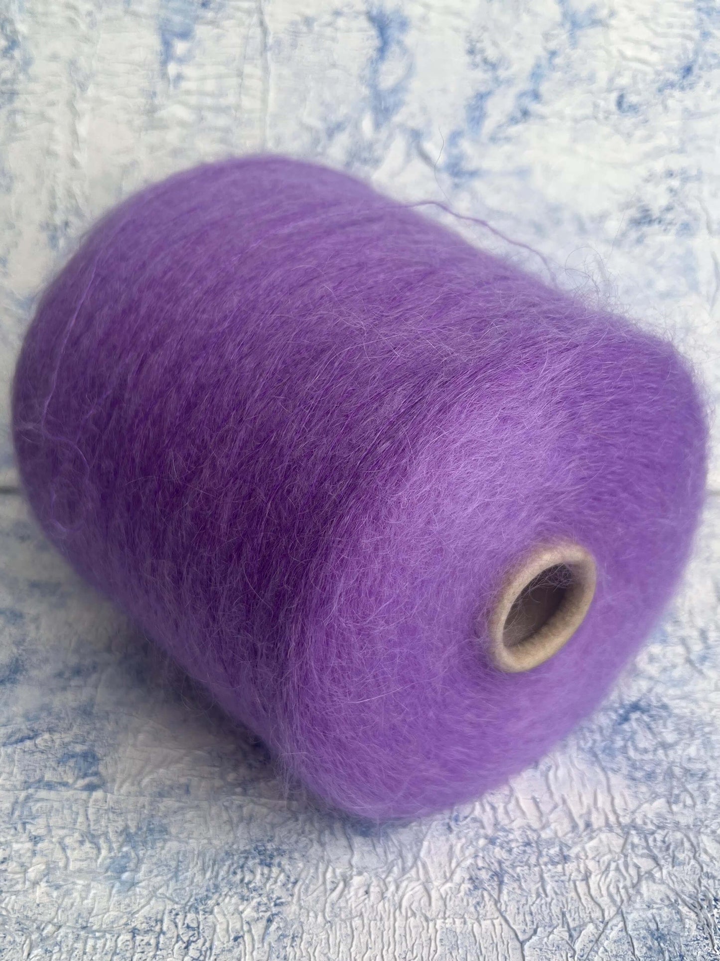 SuperKidMohair 67%, PA 30%, Merino 3%. Aurora 100 NM 10000,  Color Purple. Per 100 gr