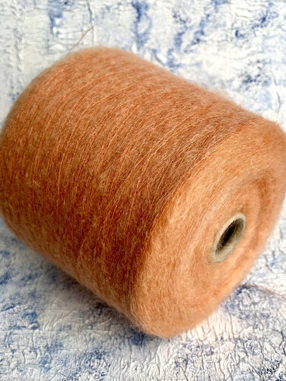 SuperKidMohair 67%, PA 30%, Merino 3%. Aurora 100 NM 10000,  Color Orange. Per 100 gr