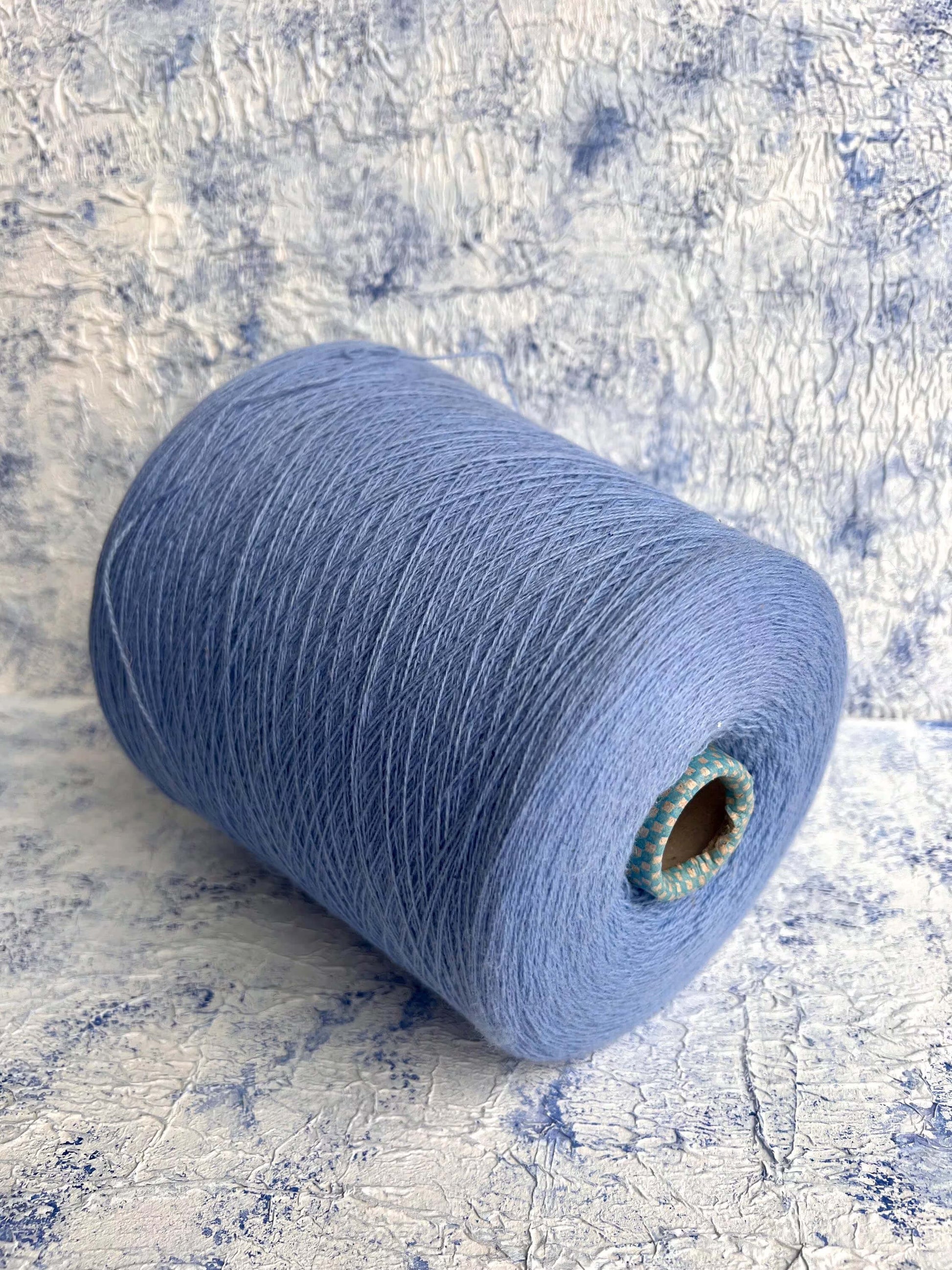 Cashmere lace yarn on cone Italian Fine Yarn for Hand Knitting or Machine Knitting.
100% Cashmere yarn. Cariaggi yarn Nm 2/28
Fiber: 100% Cashmere Yarn by Cariaggi
Yardage: 1400m per 100g / 1531 yards per 3.52oz
Colour: Egiptian Blue. This is a very soft pure cashmere yarn.