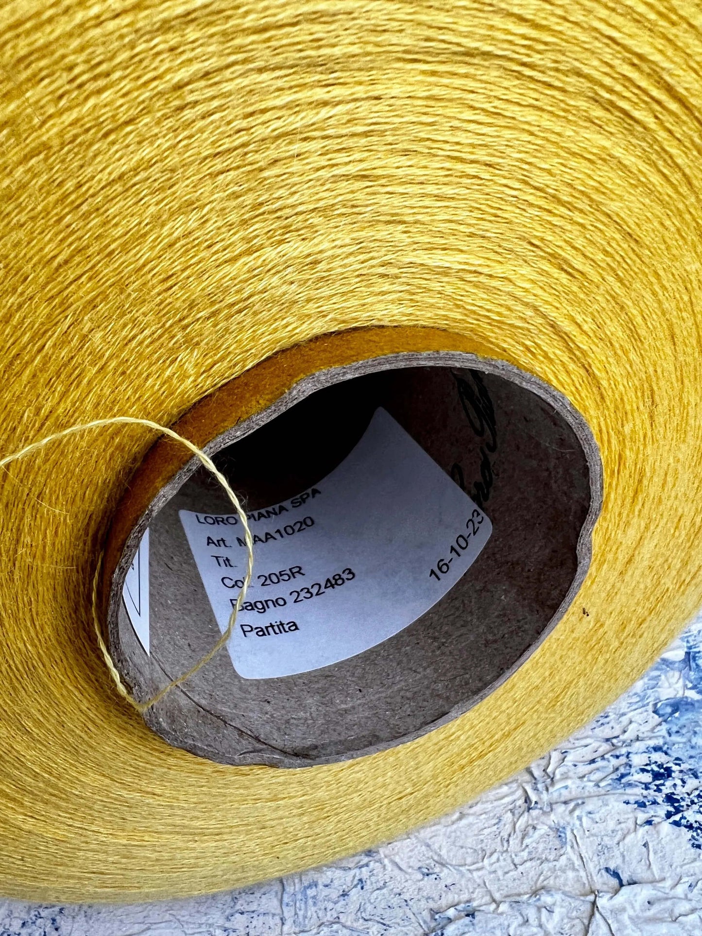 Luxurious Loro Piana yarn: 70% cashmere & 30% silk in yellow. Perfect for knitting, weaving, crochet. 100g of high-quality Italian fiber.