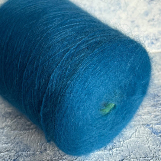 Angora yarn 80%,Poliamide Yarn 20%,Color Blue. Per 100 gr