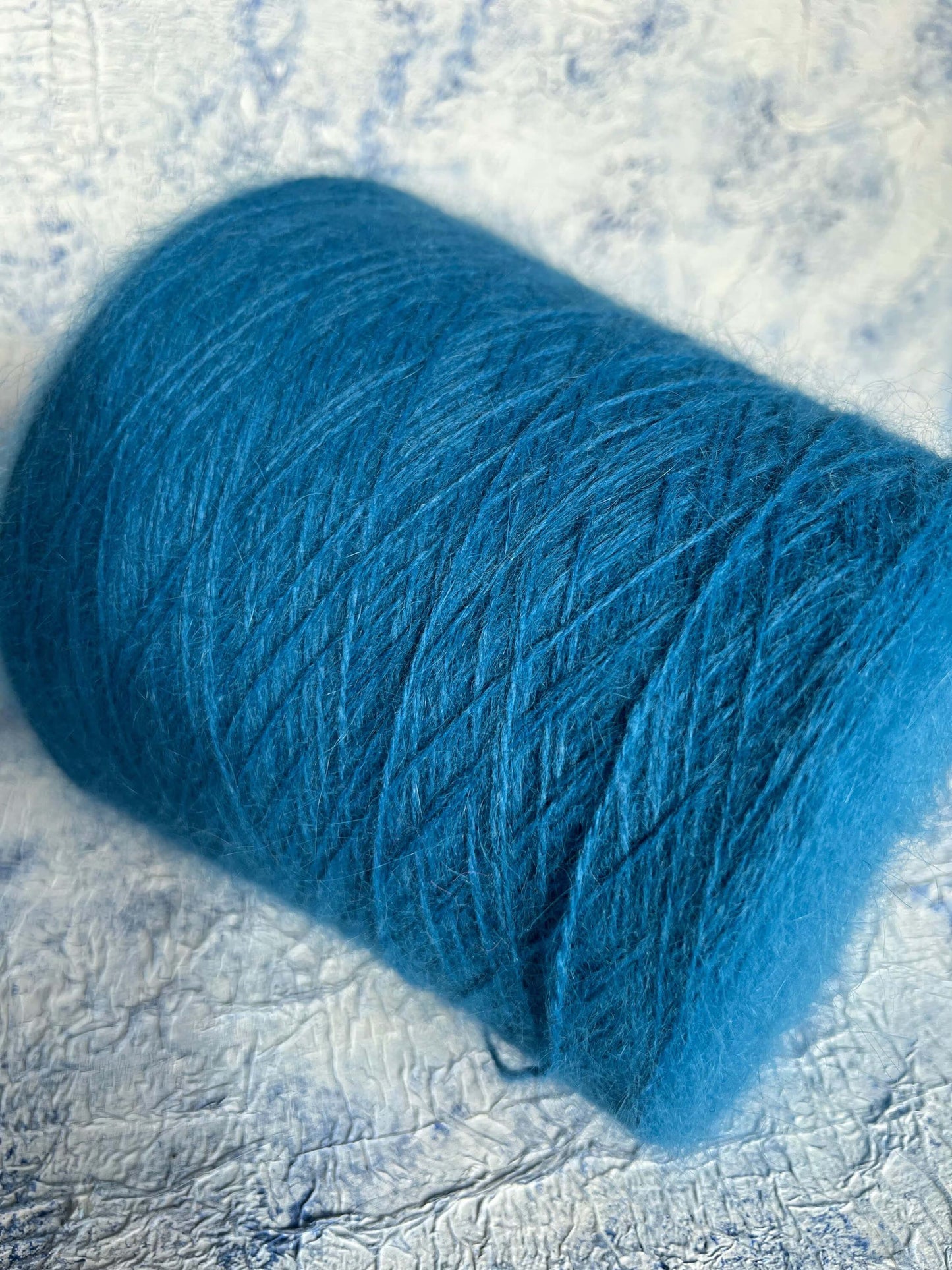 Angora yarn 80%,Poliamide Yarn 20%,Color Blue. Per 100 gr