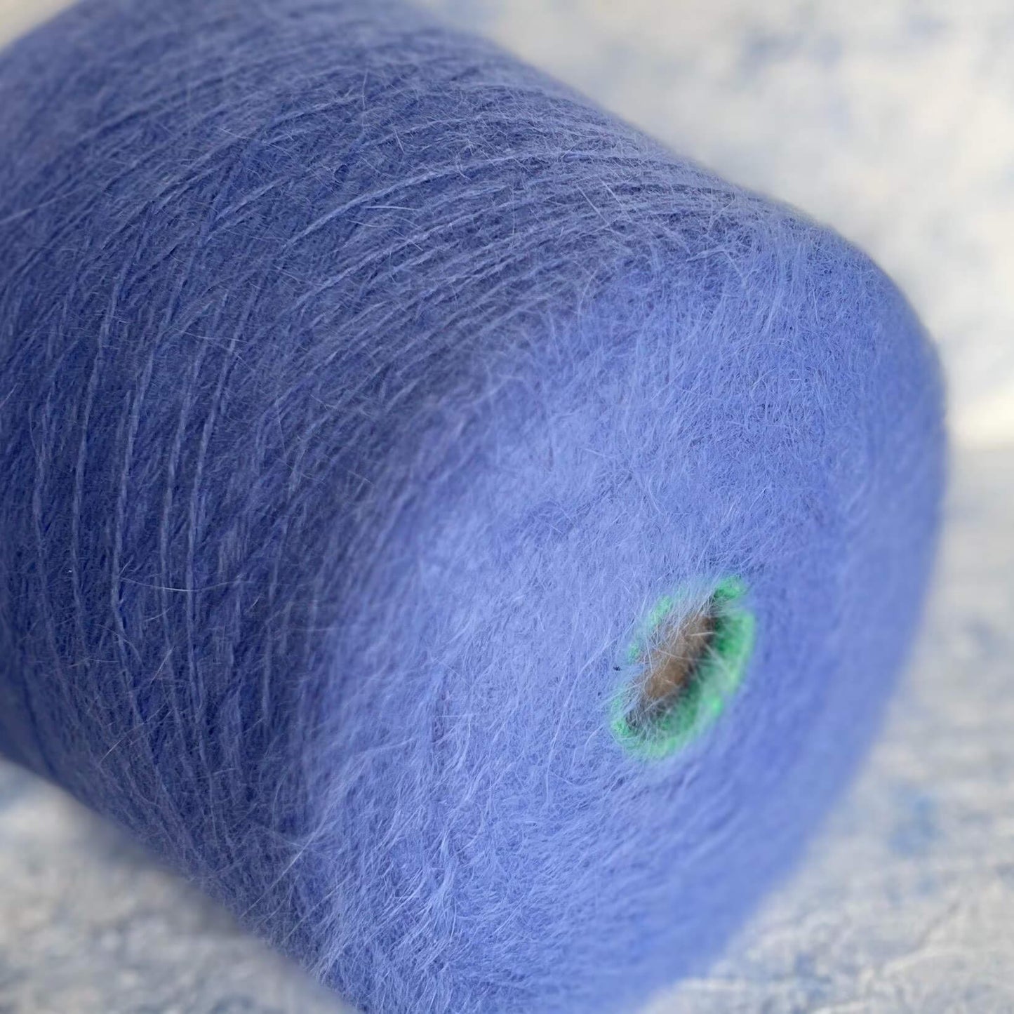 Angora yarn 80%,Poliamide Yarn 20%,Color Blue. Per 100 gr