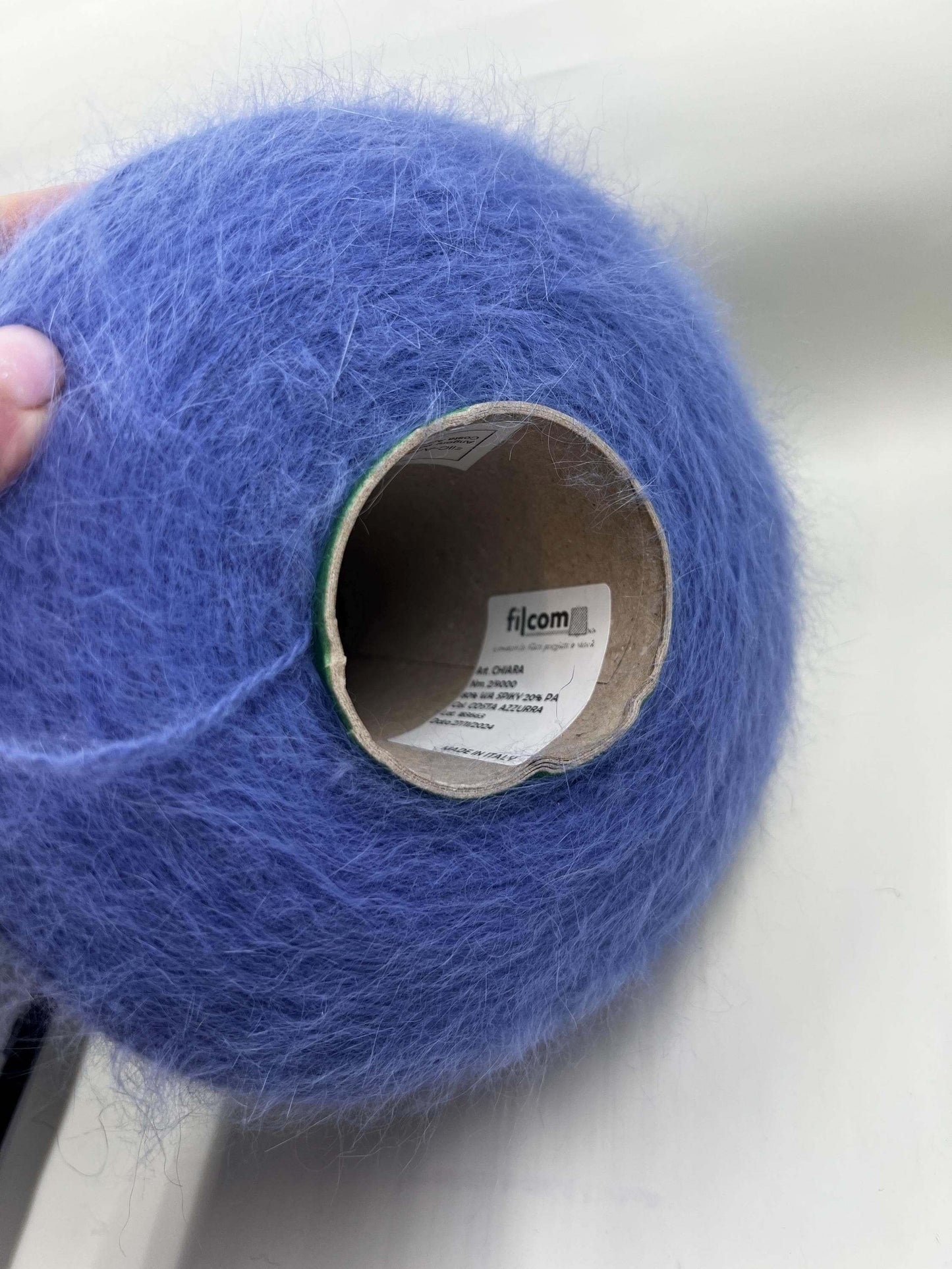 Angora yarn 80%,Poliamide Yarn 20%,Color Blue. Per 100 gr