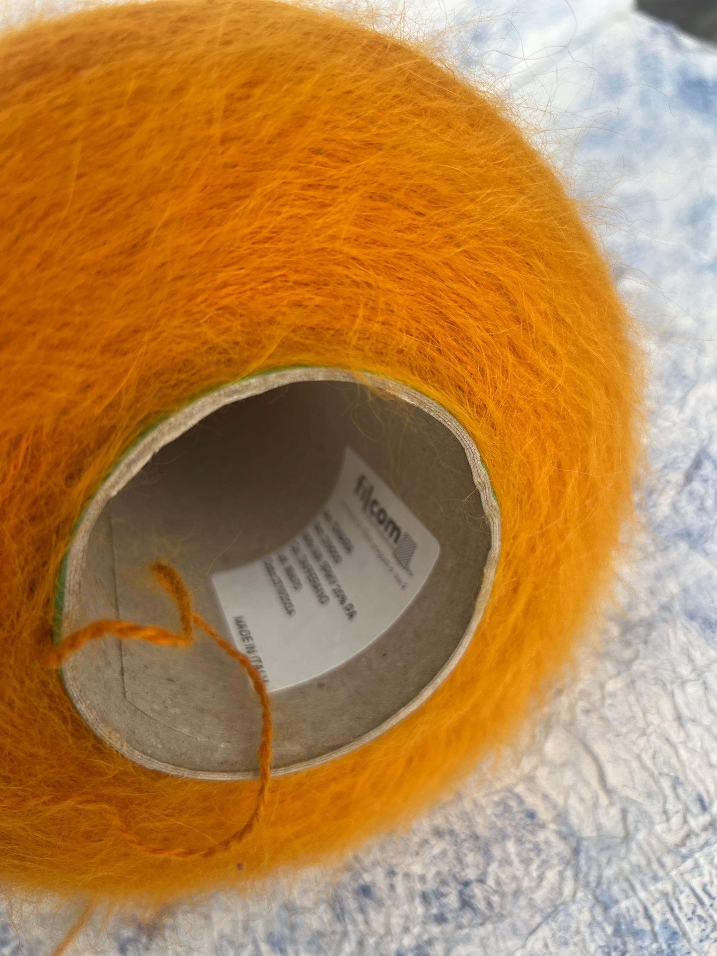 Angora yarn 80%,Poliamide Yarn 20%,Color Yellow. Per 100 gr