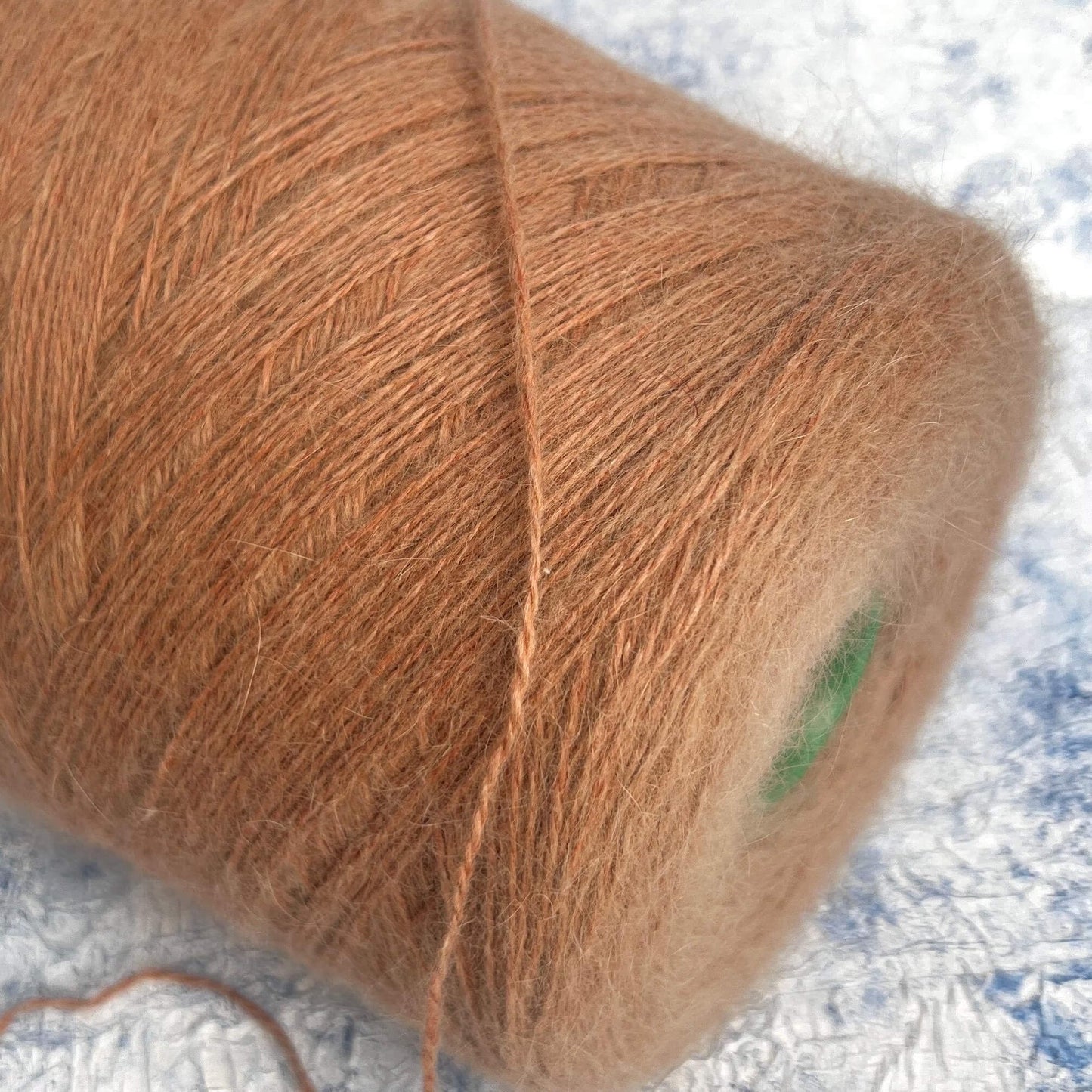 Angora yarn 80%,Poliamide Yarn 20%,Color Budino. Per 100 gr