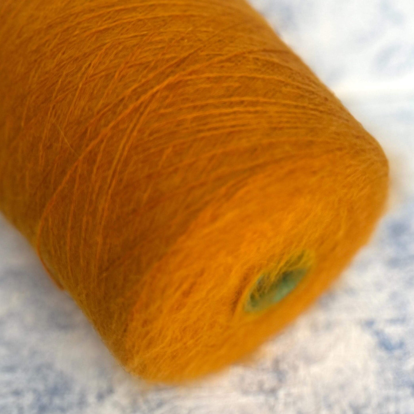 Angora yarn 80%,Poliamide Yarn 20%,Color Yellow. Per 100 gr