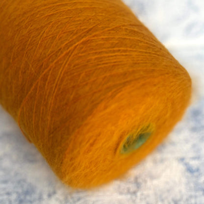 Angora yarn 80%,Poliamide Yarn 20%,Color Yellow. Per 100 gr