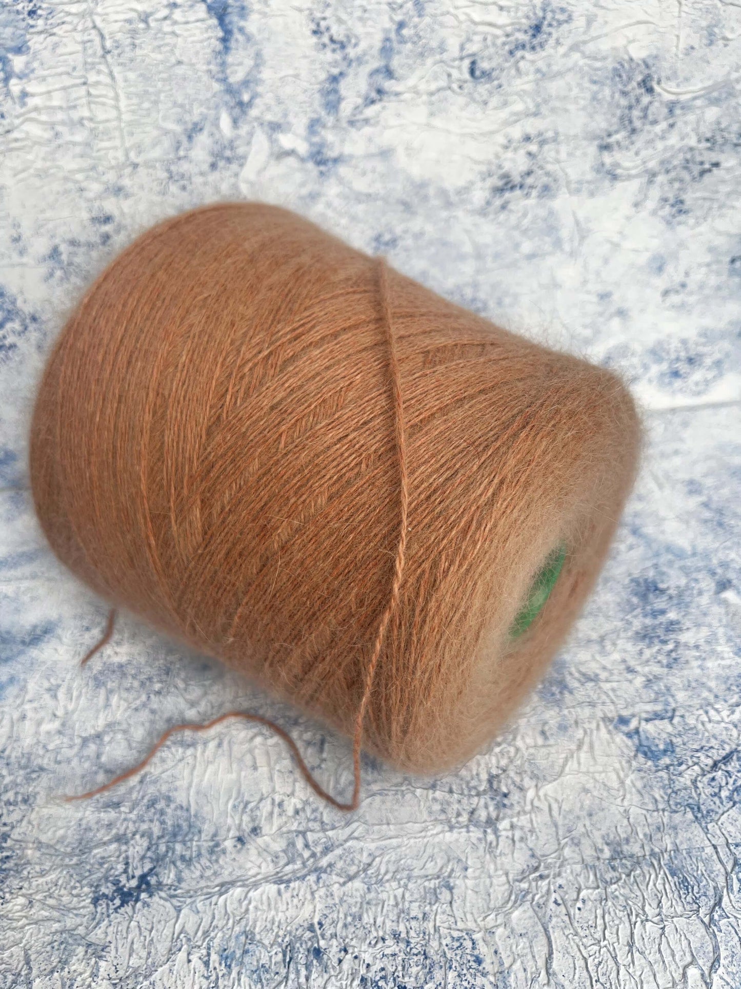 Angora yarn 80%,Poliamide Yarn 20%,Color Budino. Per 100 gr