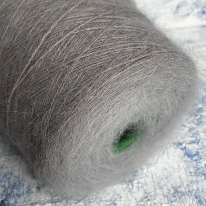 Angora yarn 80%,Poliamide Yarn 20%,Color Brezza Marina (gray). Per 100 gr