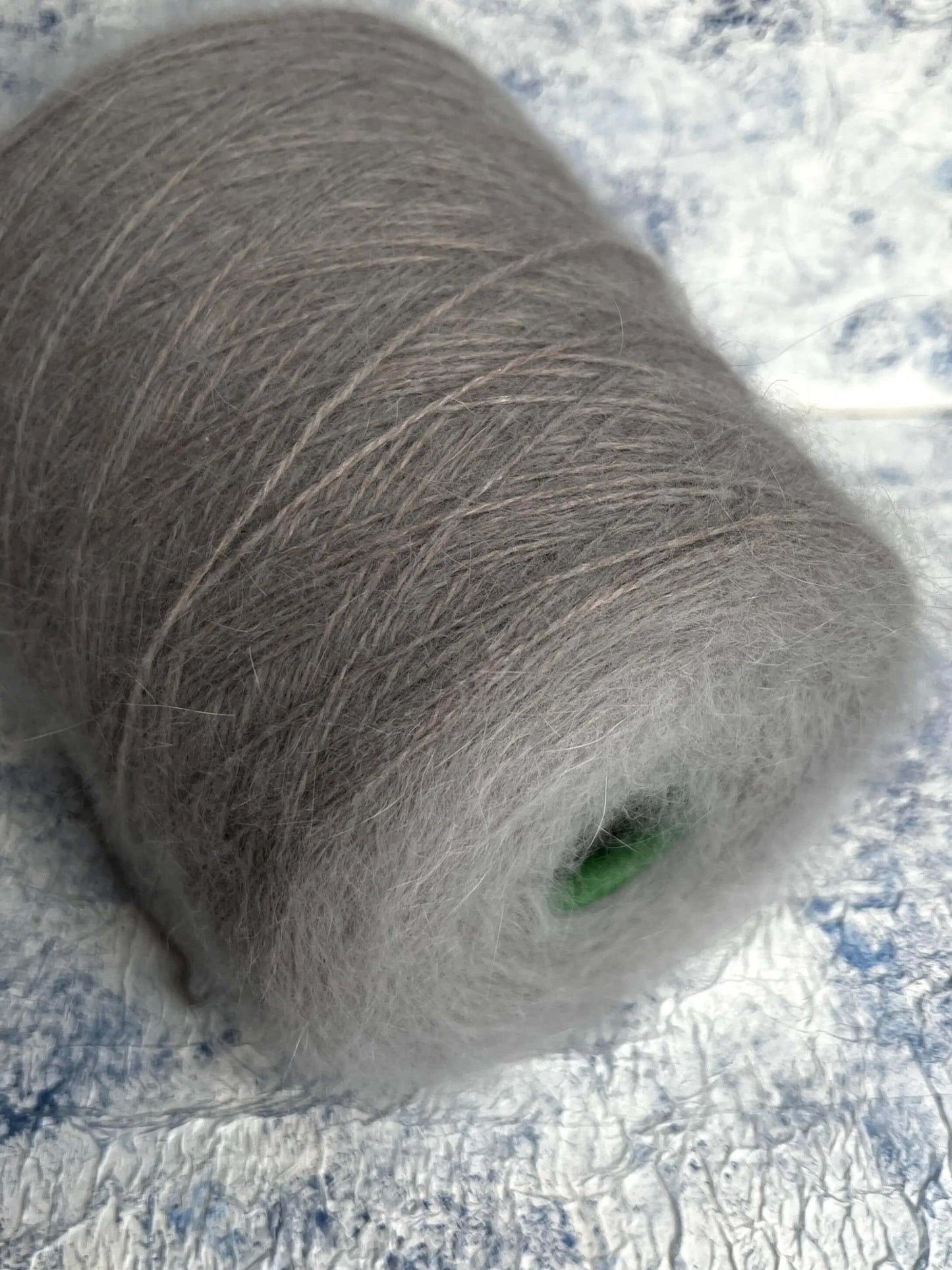 Angora yarn 80%,Poliamide Yarn 20%,Color Brezza Marina (gray). Per 100 gr