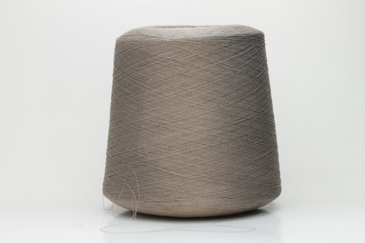 Close-up of finely spun, two-ply cotton yarn in a sophisticated muted taupe-brown, exhibiting a gentle heathered effect and subtle sheen.