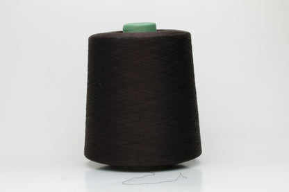 Close-up of smooth, dark Bitter Chocolate cotton yarn, tightly plied for a refined, lustrous finish. Shows even twist and deep, rich color.