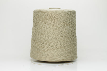 A soft, matte-finish yarn in a delicate light khaki beige, consisting of four finely twisted plies, offering a smooth, even texture.