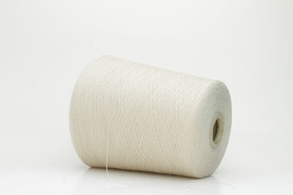 Close-up of a neatly wound cone of fine, smooth 4-ply cotton yarn in a soft off-white hue, showing a subtle matte sheen and even twist.