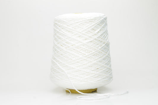Close-up of a pristine white, single-ply cotton yarn with a smooth, even texture and subtle matte sheen, gently coiled.