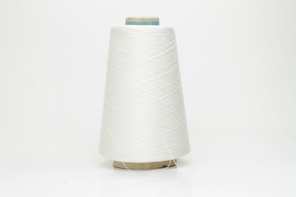 Close-up of a skein of lustrous, pure white silk yarn, tightly plied with a smooth, radiant finish, reflecting light softly.