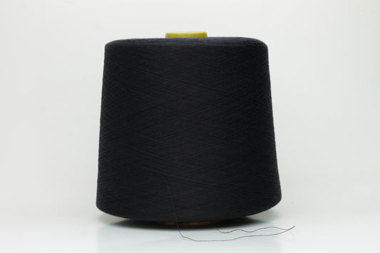 Close-up of a tightly twisted, fine Nm 2/100 cotton yarn in a deep, lustrous midnight blue hue, showcasing its smooth texture and subtle sheen.