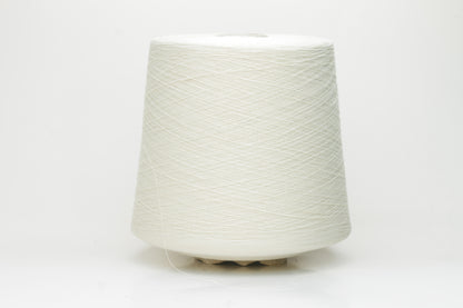 Close-up of pristine white, two-ply cotton yarn, tightly twisted with a subtle matte sheen. Smooth, uniform texture showcasing fine individual fibers.