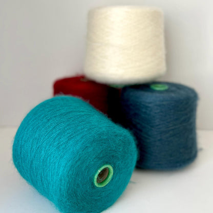 Super Kid Mohair 70 & Silk 30 % yarn on Cone. White. Per 100 gr