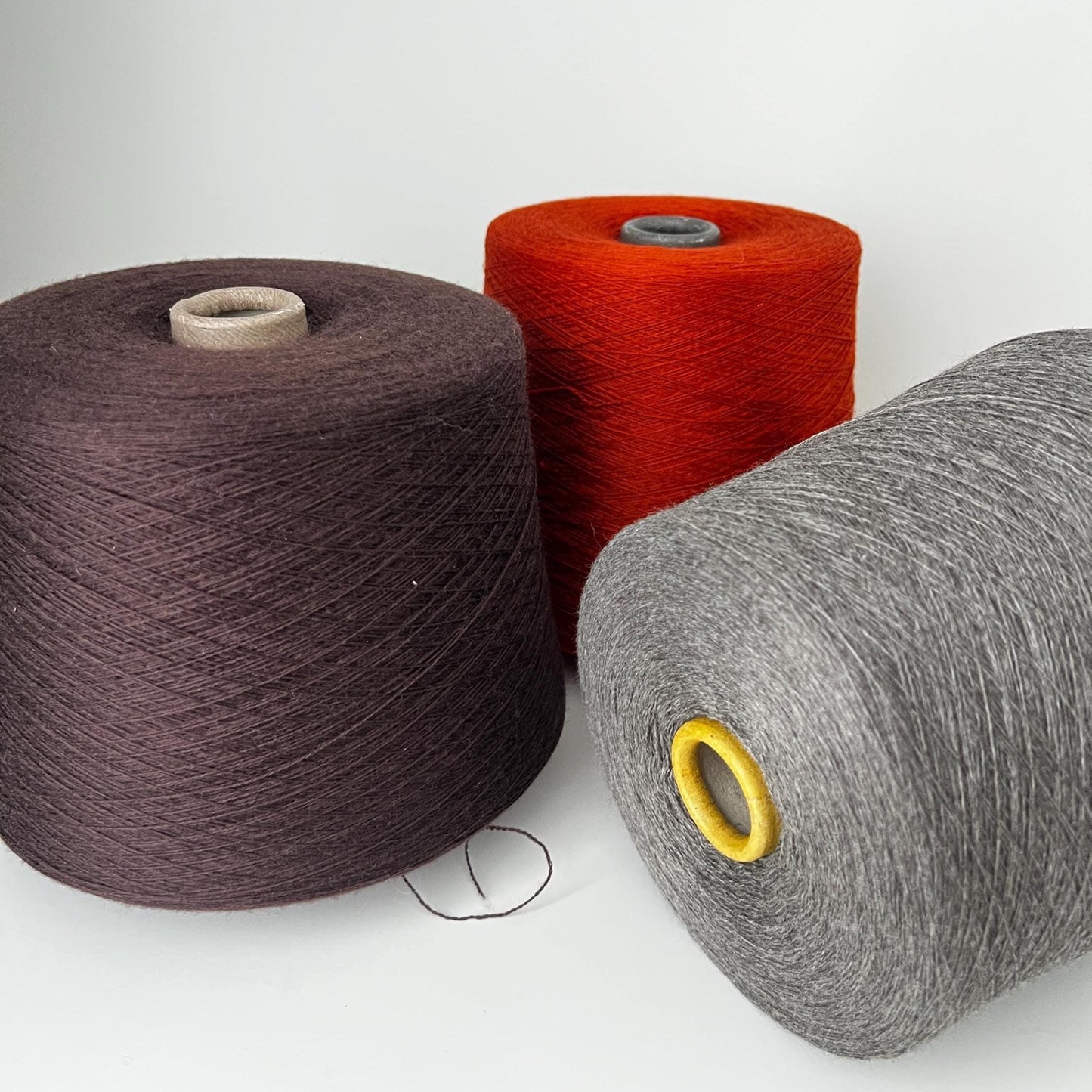 100% Merino yarn on cone. Cashwool,Nm2/30, ZEGNA,Color Rust.Per 100 gr