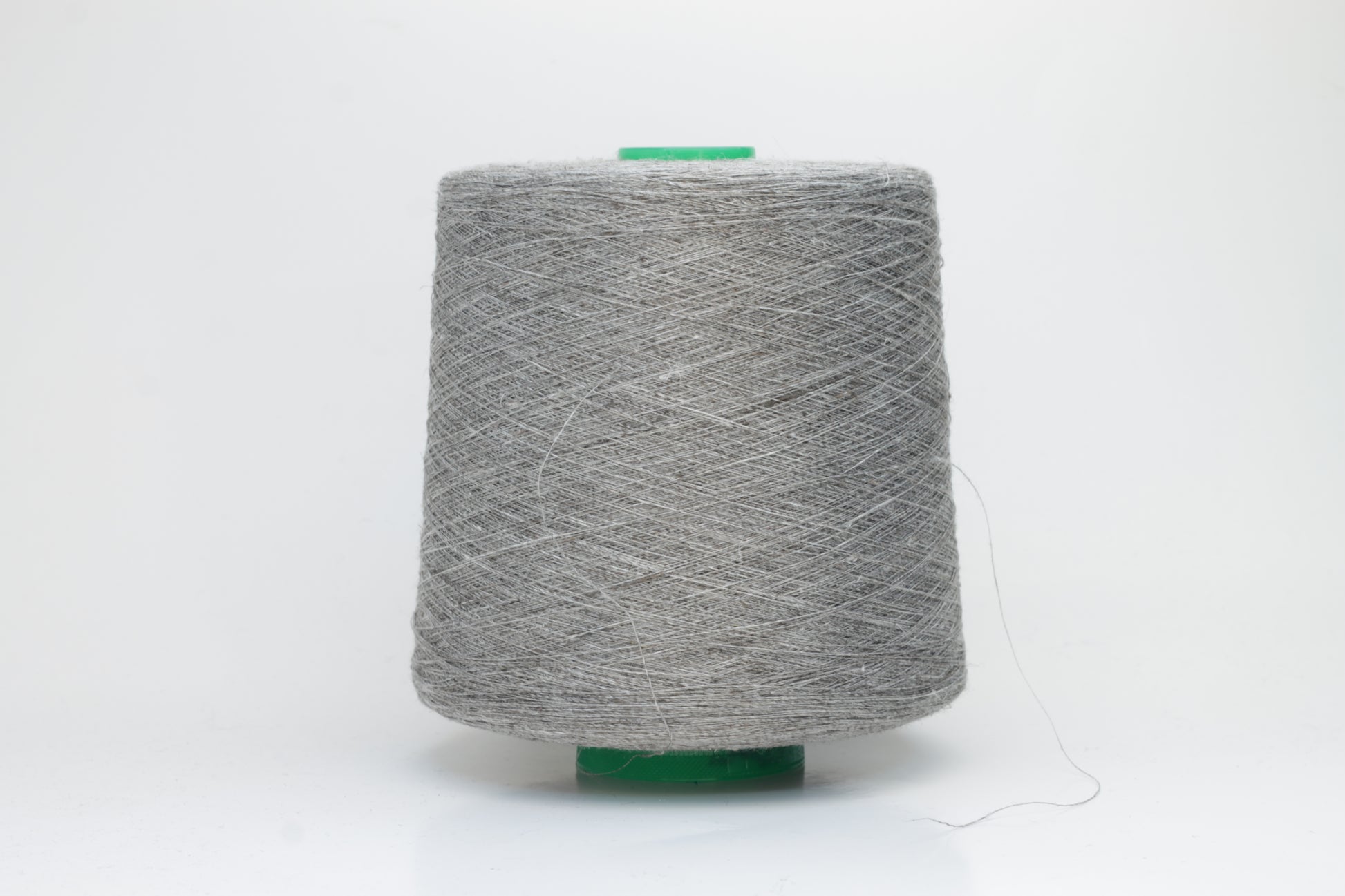 Fine, single-ply linen yarn in a New Opale. Reveals a crisp texture and subtle natural sheen, typical of pure linen fiber.