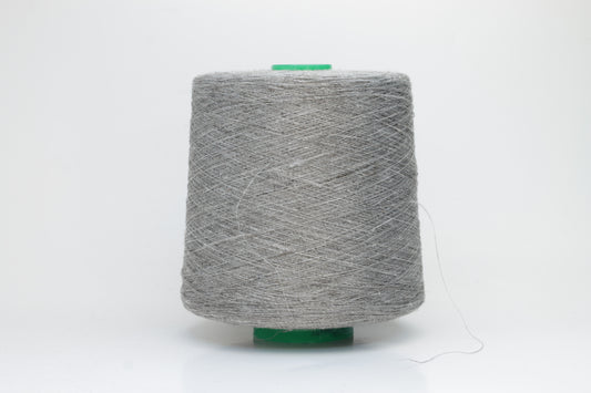 Fine, single-ply linen yarn in a New Opale. Reveals a crisp texture and subtle natural sheen, typical of pure linen fiber.