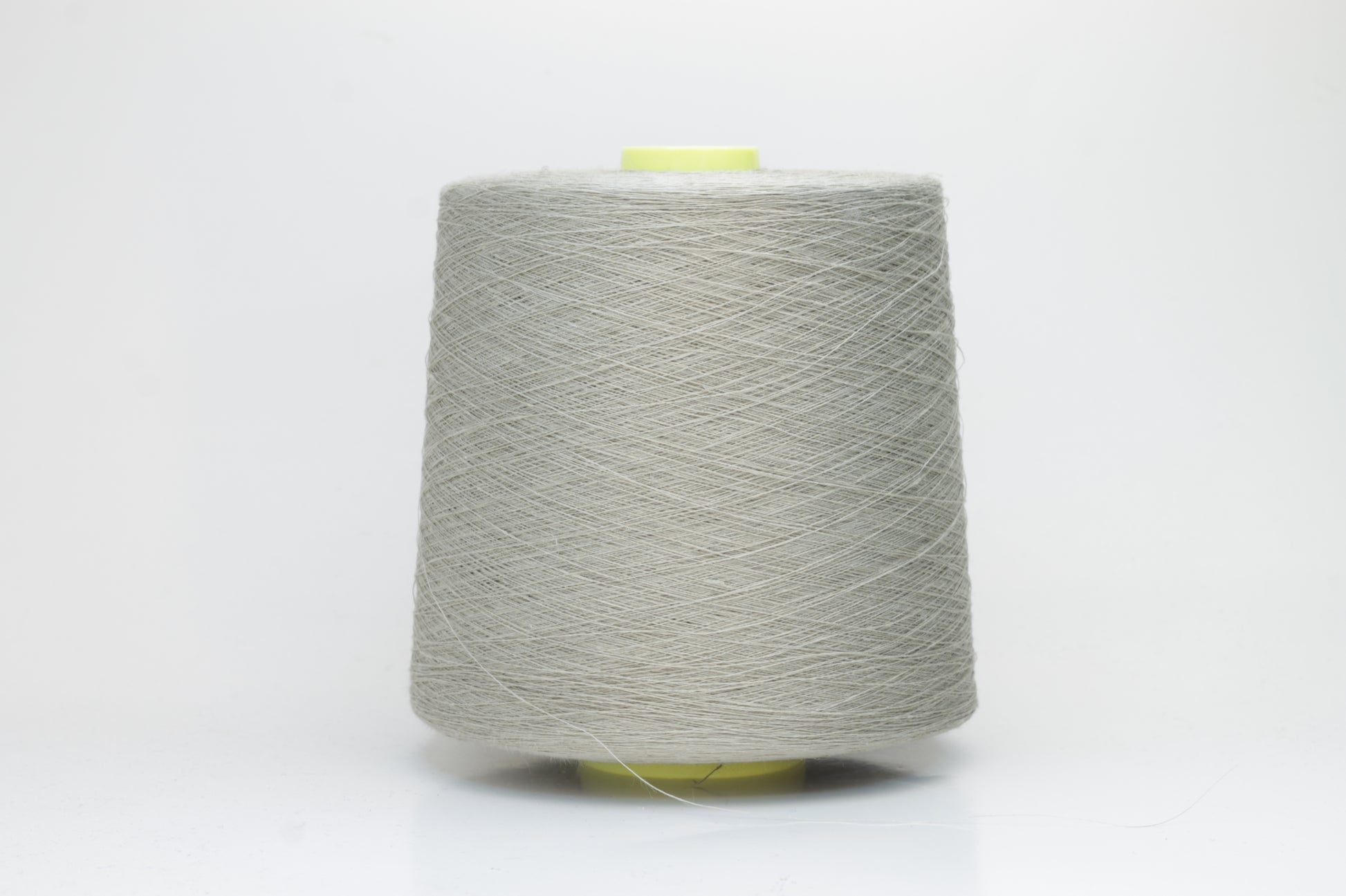 Fine, single-ply linen yarn in a rich Naturale. Reveals a crisp texture and subtle natural sheen, typical of pure linen fiber.
