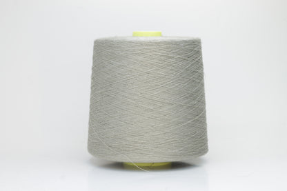 Fine, single-ply linen yarn in a rich Naturale. Reveals a crisp texture and subtle natural sheen, typical of pure linen fiber.