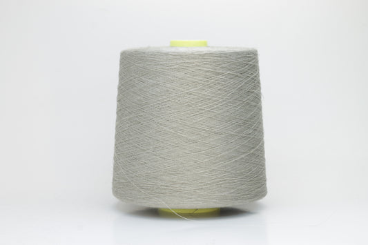 Fine, single-ply linen yarn in a rich Naturale. Reveals a crisp texture and subtle natural sheen, typical of pure linen fiber.