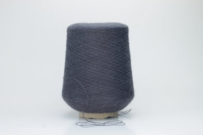 Rich Gray 2-ply Alpaca Merino yarn, softly twisted with a gentle halo and subtle sheen, showcasing its deep, luxurious color saturation.