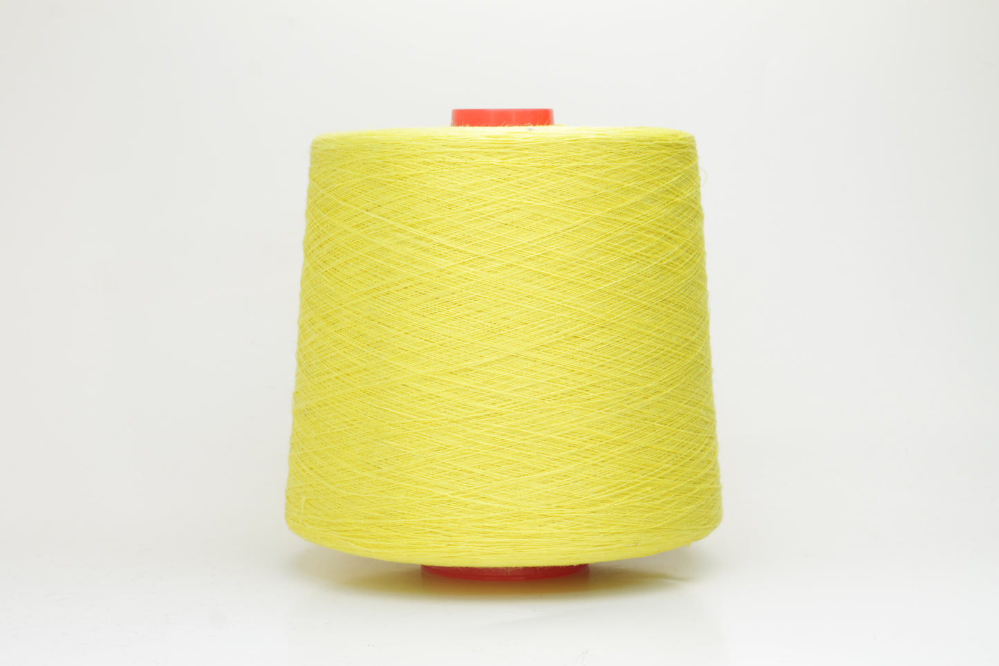 Fine, single-ply linen yarn in a Canarino. Reveals a crisp texture and subtle natural sheen, typical of pure linen fiber.