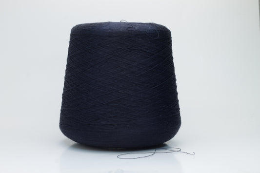 A gleaming skein of fine-gauge, two-ply silk yarn, deep rich dark navy hue, showcasing smooth texture & luxurious natural sheen.