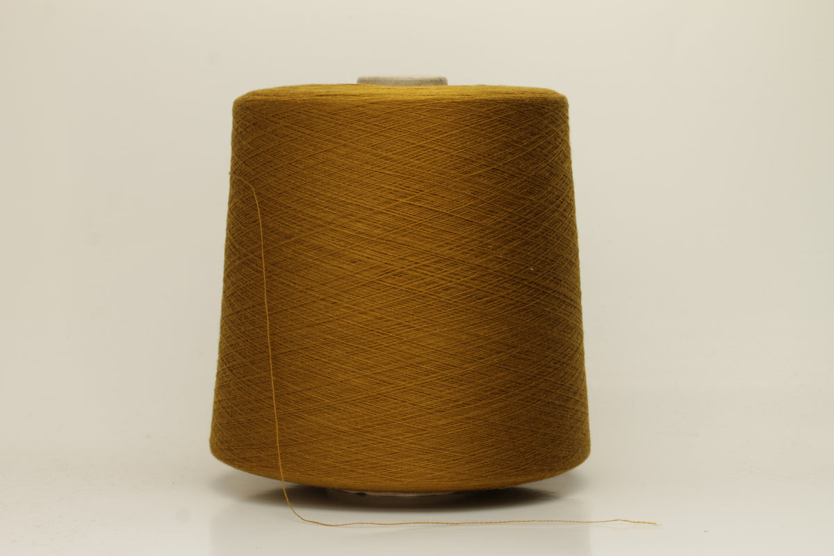 Luxurious, fine Loro Piana silk yarn in a rich, deep dark mustard color. Smooth, evenly spun single strand with a brilliant natural sheen.