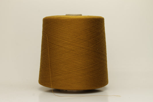 Luxurious, fine Loro Piana silk yarn in a rich, deep dark mustard color. Smooth, evenly spun single strand with a brilliant natural sheen.