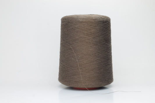 Fine, single-ply linen yarn in a rich Brown. Reveals a crisp texture and subtle natural sheen, typical of pure linen fiber.
