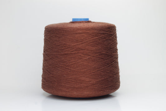 Fine, single-ply linen yarn in a rich Cacao. Reveals a crisp texture and subtle natural sheen, typical of pure linen fiber.