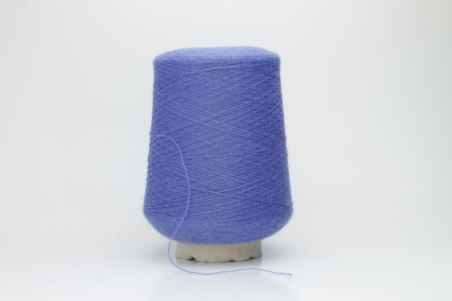 Violet Blue 2-ply Alpaca Merino yarn, softly twisted with a gentle halo and subtle sheen, showcasing its deep, luxurious color saturation.