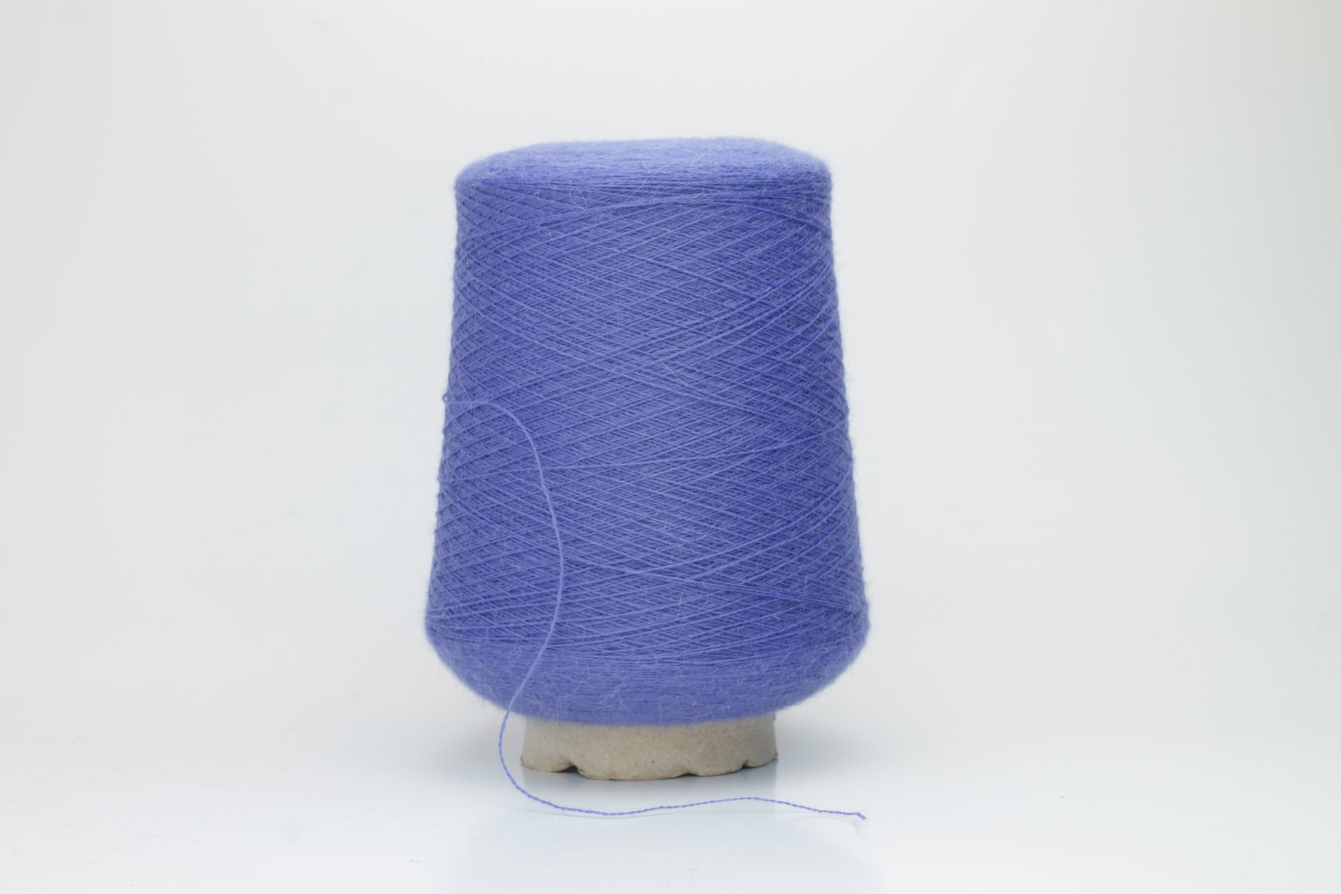Violet Blue 2-ply Alpaca Merino yarn, softly twisted with a gentle halo and subtle sheen, showcasing its deep, luxurious color saturation.