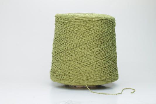 Close-up view of the Silk Bourette 100% yarn in Olive color, showcasing its exceptionally fine ply twist and soft sheen – a luxurious texture perfect for knitting or weaving.
