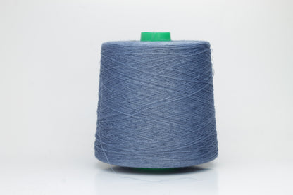 Fine, single-ply linen yarn in a rich Oceano. Reveals a crisp texture and subtle natural sheen, typical of pure linen fiber.