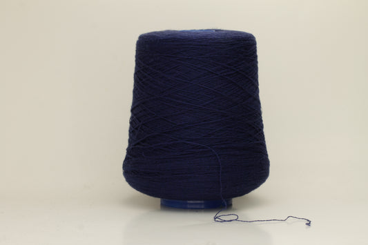 Rich, White 2-ply yarn with a fine, smooth twist; exhibits a subtle sheen and incredibly soft, uniform texture.