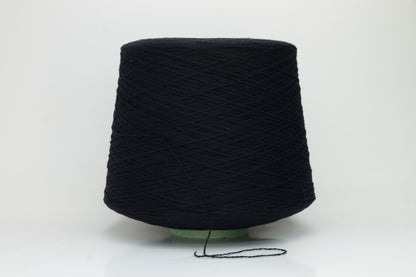 Luxurious black cashmere yarn, two-ply twist with a subtle sheen, displaying deep, consistent color and a fine, soft texture ready for crafting.