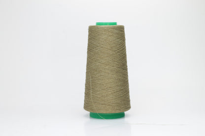 Fine, single-ply linen yarn in a rich Deserto. Reveals a crisp texture and subtle natural sheen, typical of pure linen fiber.