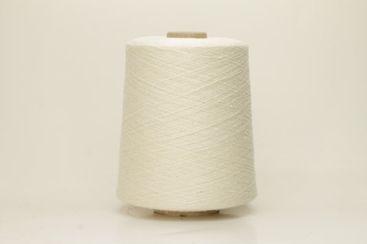 A tightly twisted single strand of luxurious deep royal blue silk yarn, reflecting light with a soft, natural sheen.