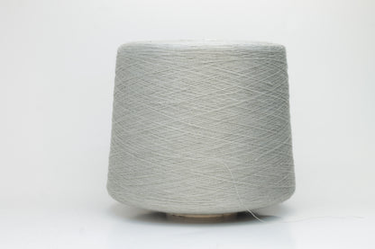 Fine, single-ply linen yarn in a rich Silver. Reveals a crisp texture and subtle natural sheen, typical of pure linen fiber.