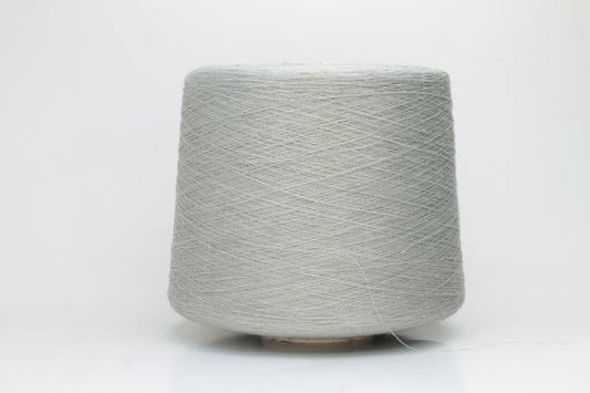 Fine, single-ply linen yarn in a rich Silver. Reveals a crisp texture and subtle natural sheen, typical of pure linen fiber.