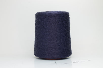 Fine, single-ply linen yarn in a rich Blue Boy. Reveals a crisp texture and subtle natural sheen, typical of pure linen fiber.